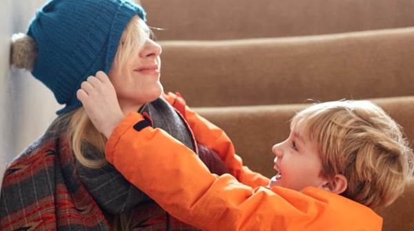 Woman playing with toddler