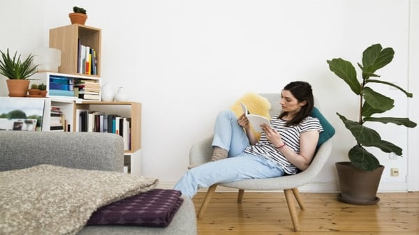 Woman reading policy