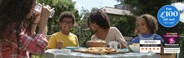 Life Insurance with £100 free gift card. Family sitting around the garden table